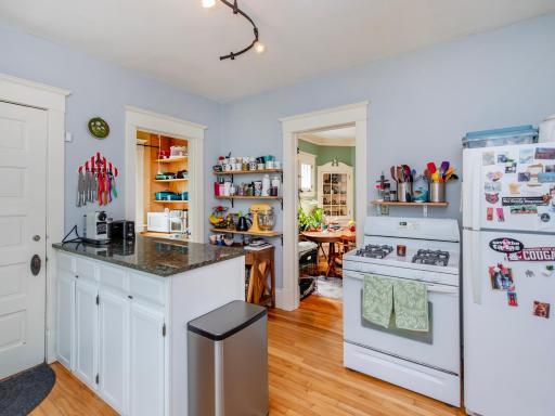 Functional kitchen featuring a peninsula that provides additional storage and prep space.