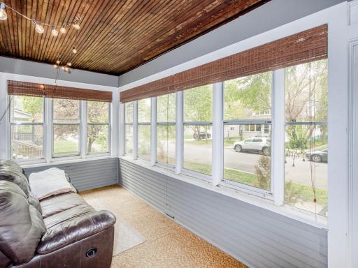 Enjoy your morning coffee or unwind at the end of the day on the charming enclosed front porch â a cozy space perfect for relaxing evenings in every season.