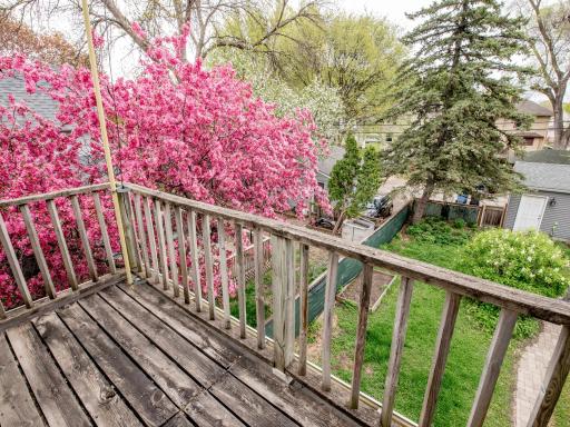 Private upper level deck overlooking the backyard.