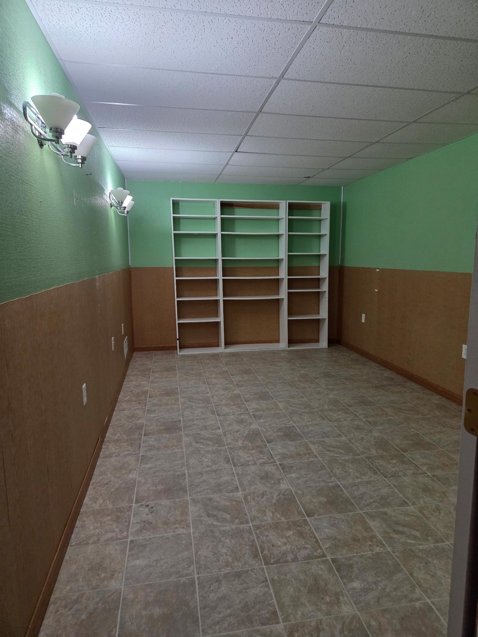 Optional additional bedroom or would make great family/rec room