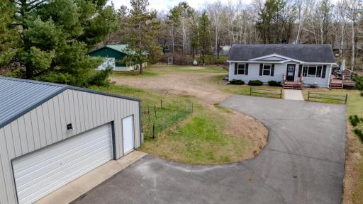 Main house and guest area in shop plus garage