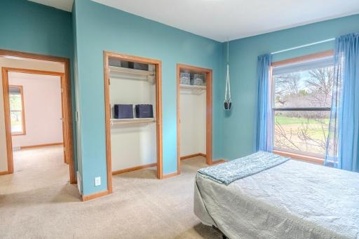 Main floor bedroom showing double closets