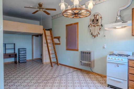 Loft area and living/dining area inside apartment