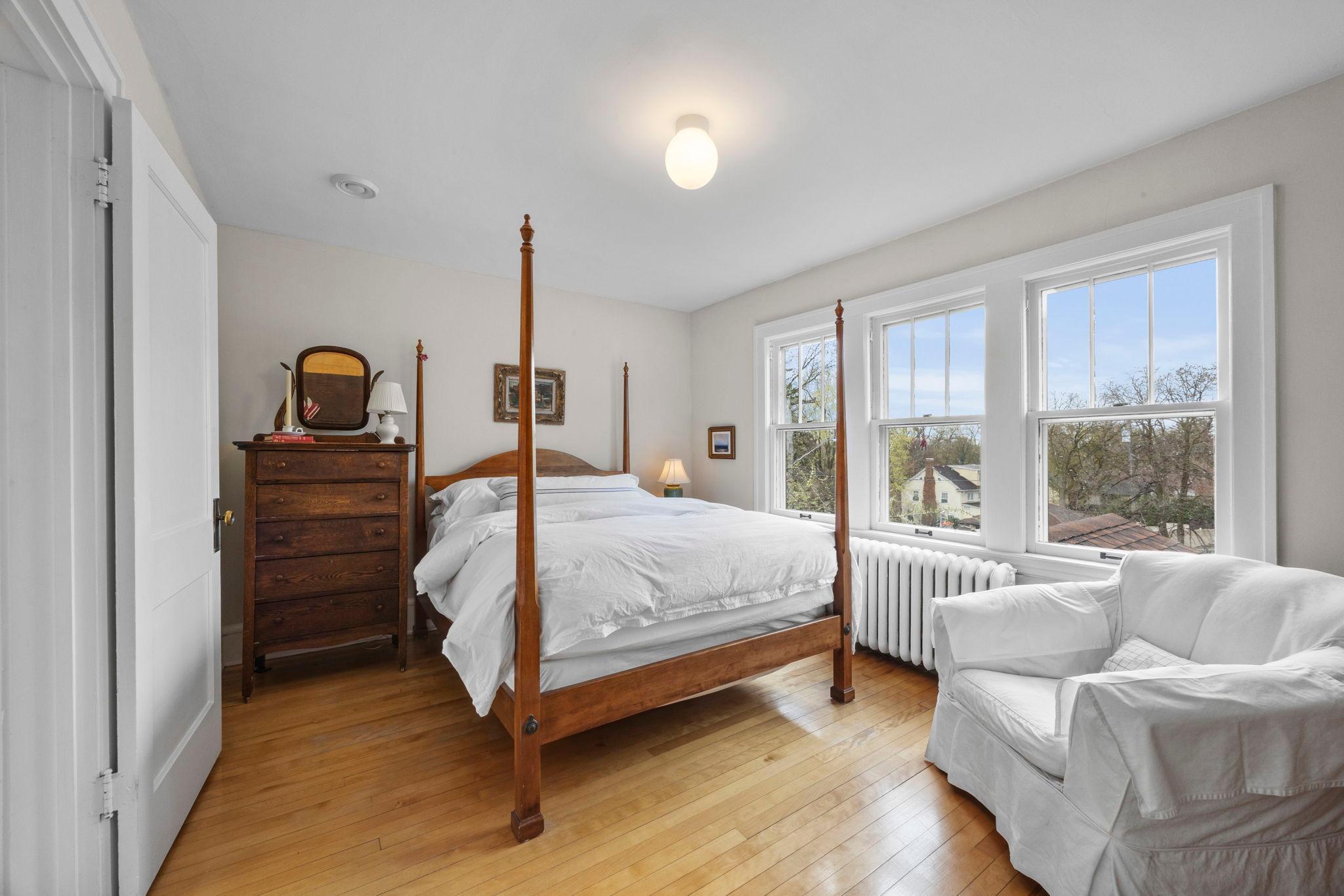 Primary bedroom towards window.