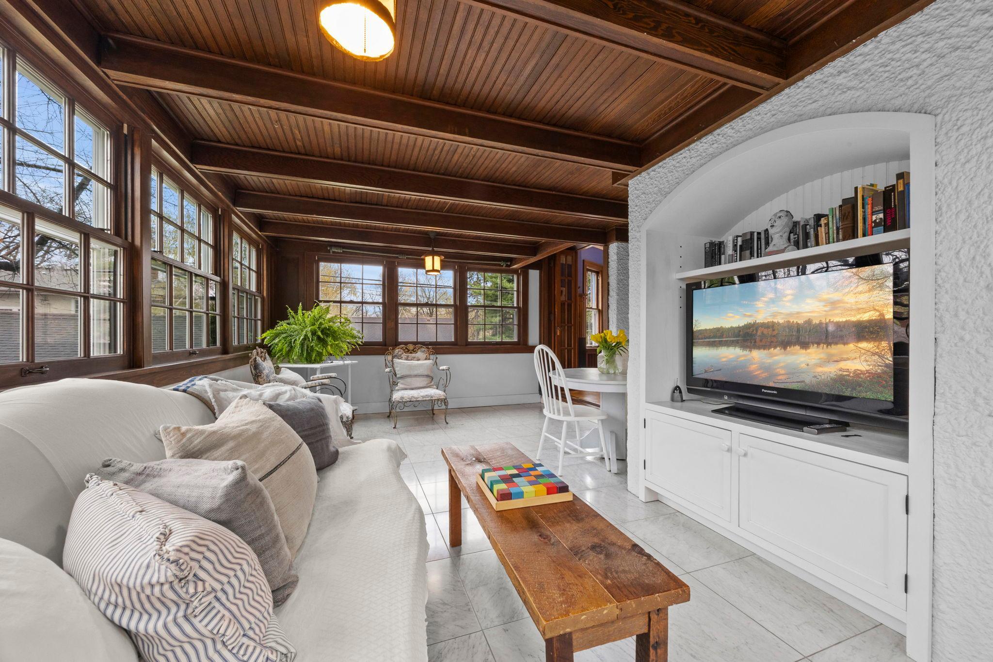 Sunroom with original beadboard