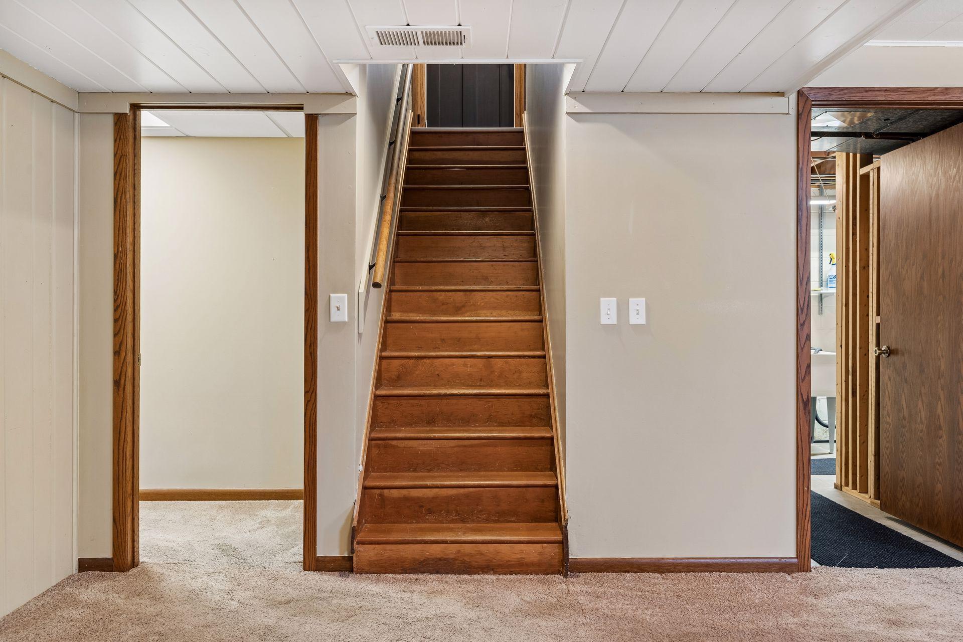 30x14 Lower Level family room with Wood Burning fireplace, and south-facing windows