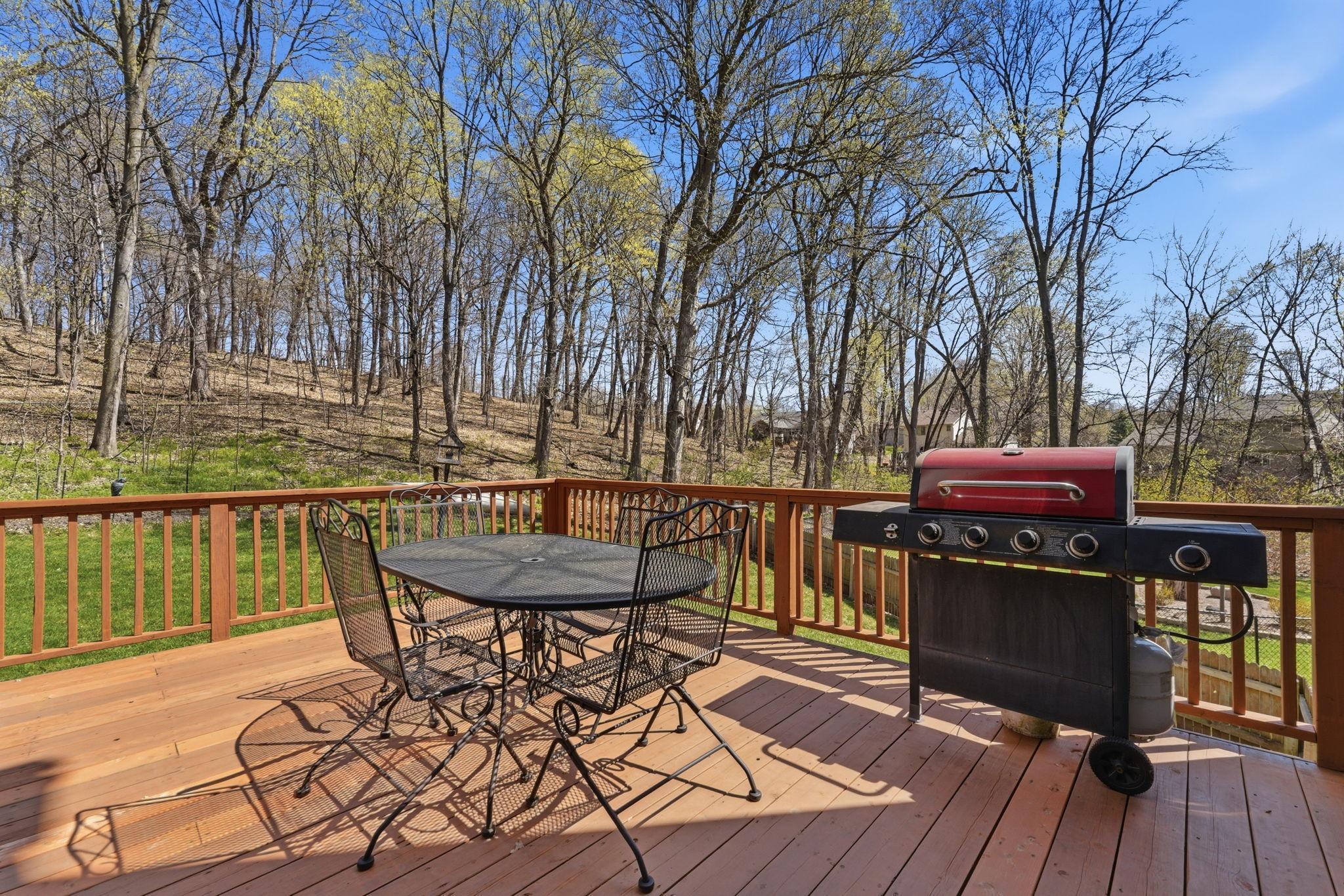 You will never get tired of these views! Hard to find this type of private lot at this price point! Picture enjoying time with family and friends for a BBQ on this great deck.