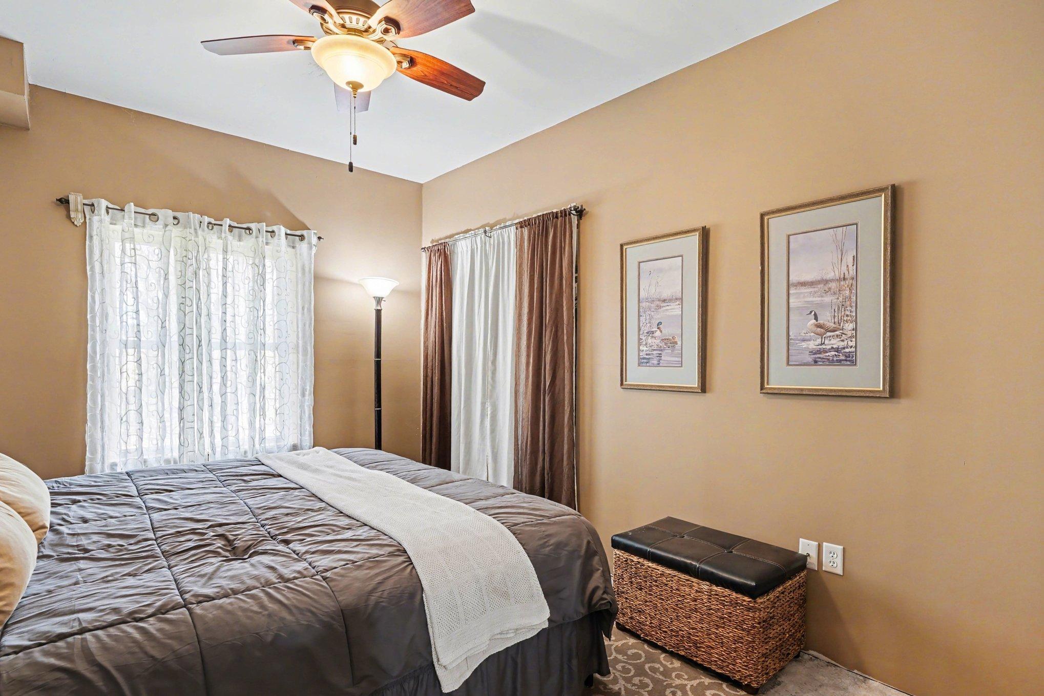3rd bedroom in lower level with daylight window.