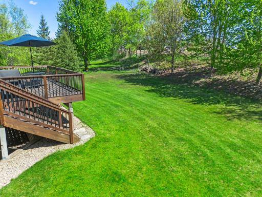 Situated on just over a half-acre lot, the property offers space for outdoor play, recreation, and relaxation.