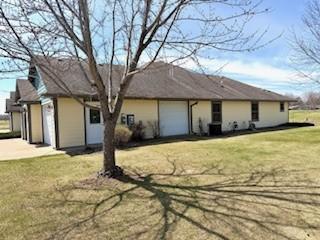 Convenient garage service door and golf cart entrance.jpg