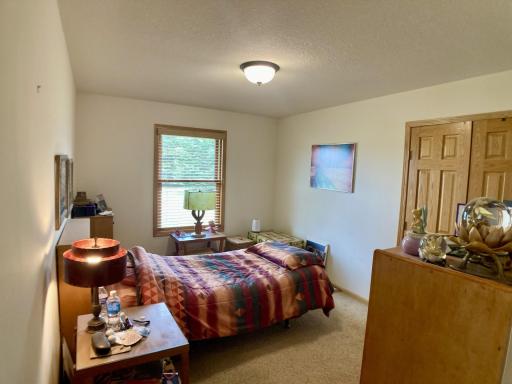 Guest bedroom with solid core french closet doors.jpg