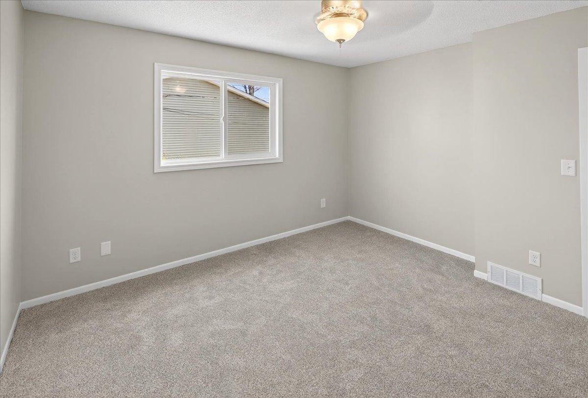 Fresh carpet and ceiling fans too