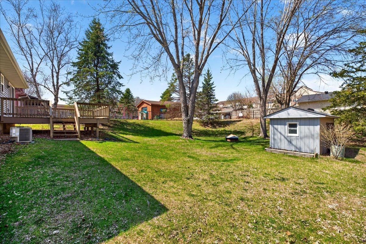 Large yard with extra storage shed