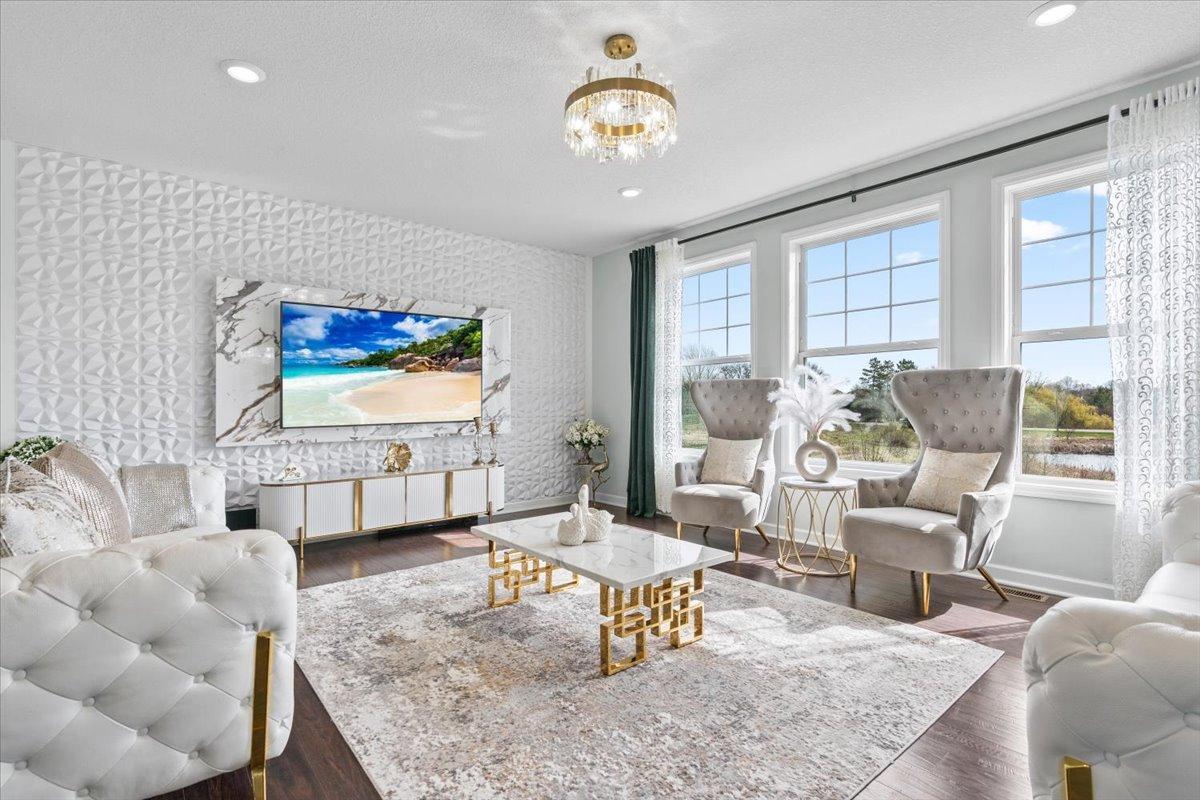 Living room with upgraded wall and Tv frame