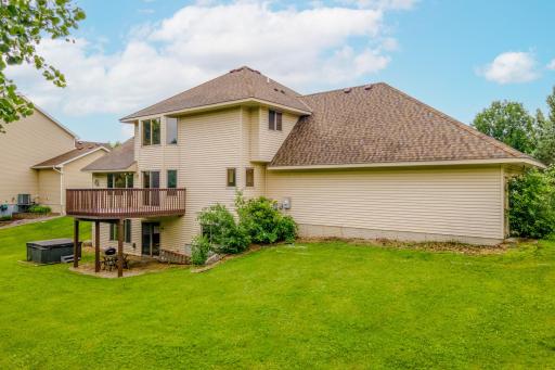 Large backyard with plenty of room to play, garden, or simply unwind in a peaceful setting.