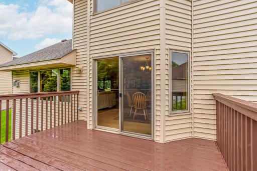 Convenient deck access from the dining area makes entertaining and everyday living effortless.