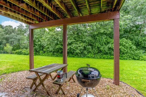 Relax or entertain beneath the deck, ready for summer fun.