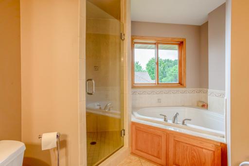 Enjoy the best of both worlds with a corner tub and separate walk-in shower.