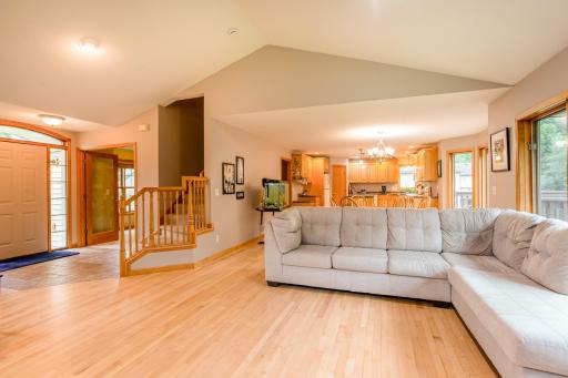 Vaulted ceilings and an open-concept layout create a bright, comfortable setting for everyday living and entertaining.