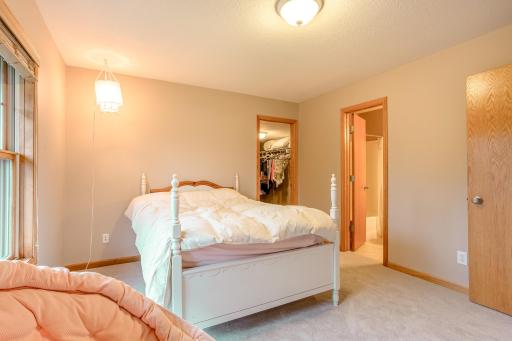Inviting bedroom offers room to unwind, complete with a walk-in closet and direct access to the walk thru bathroom.