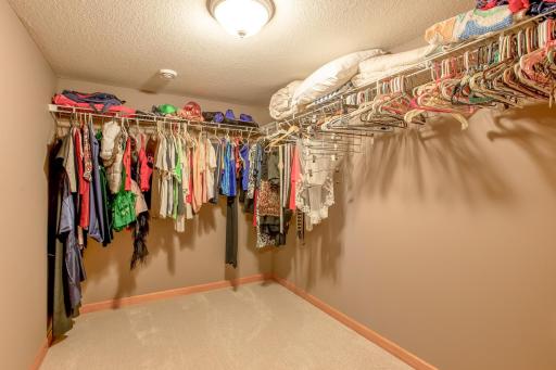 Large walk-in closet provides exceptional storage and organization for clothing, accessories, and more.