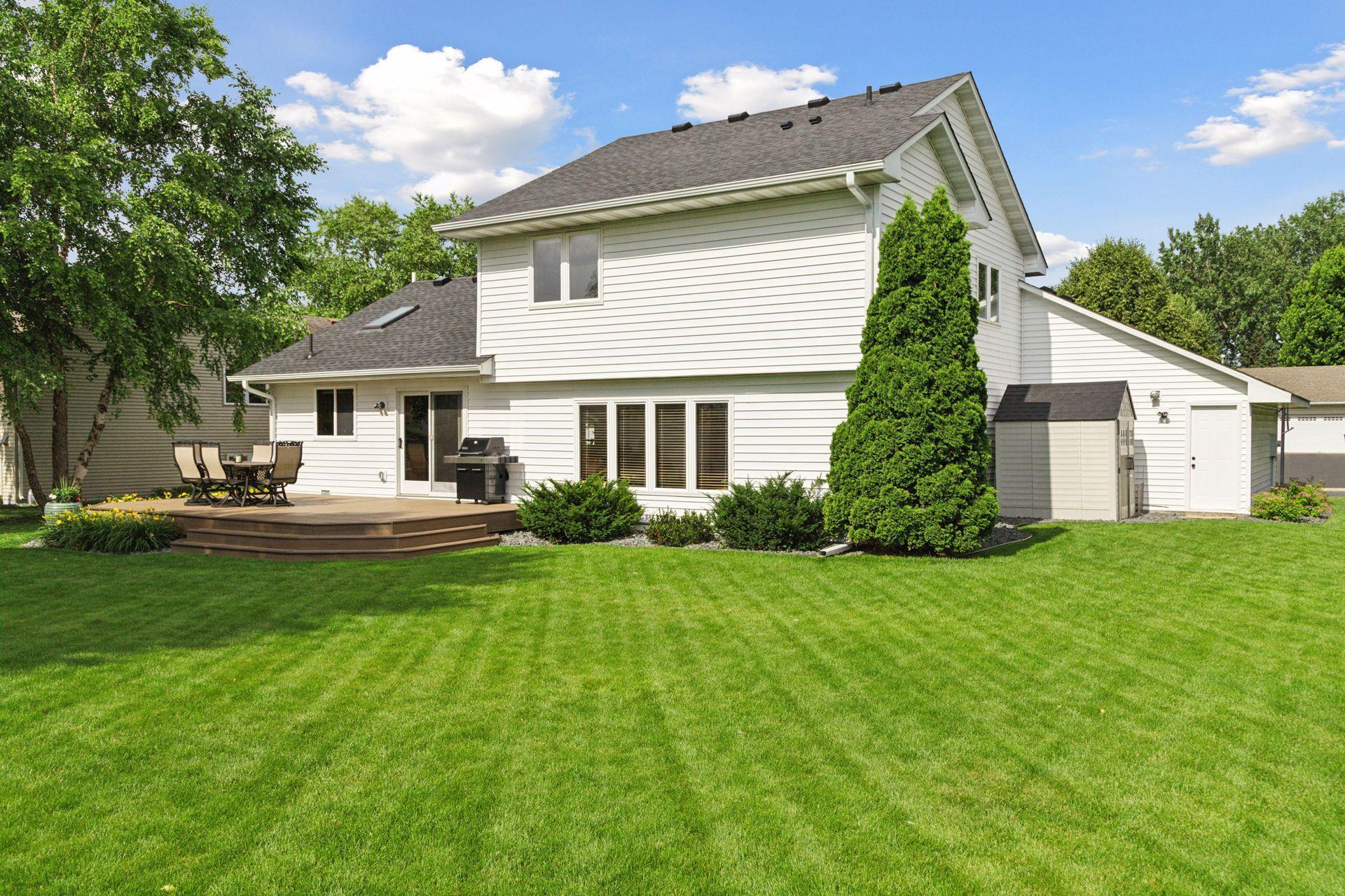Amazing flat backyard that is great for entertaining and play.