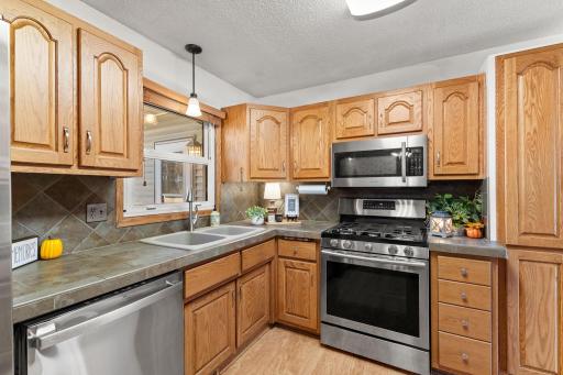 Well-equipped kitchen with abundant storage.