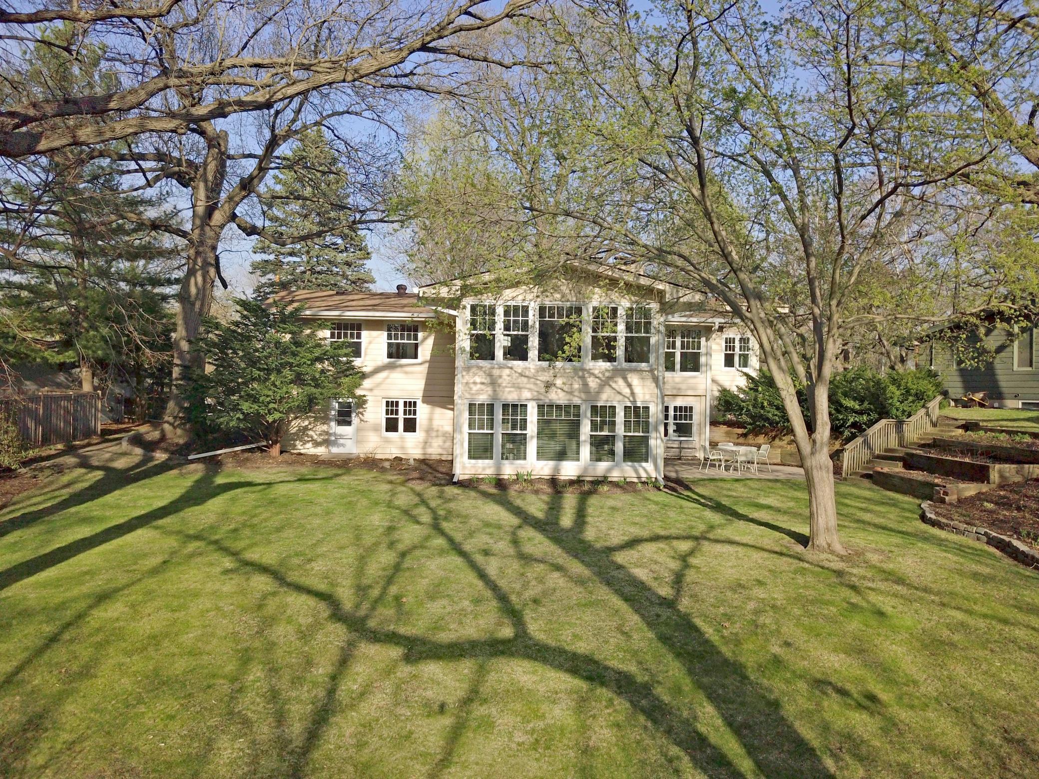 With one of the few large flat lots on the creek, this private oasis is perfect for throwing a ball, entertaining or just hanging out and watching the theater of seasons unfold.