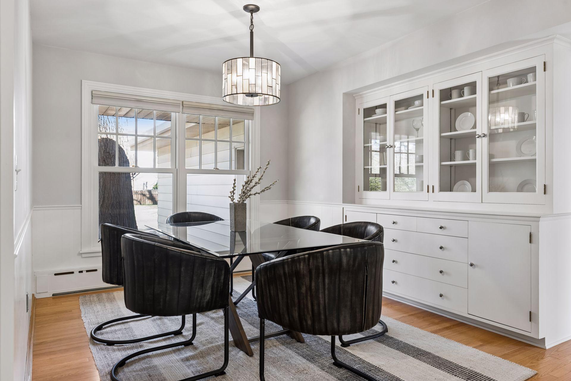 The formal dining room has a custom built in hutch with plenty of cabinets, drawers and even a glassed upper cabinet - perfect for displaying all of your collections and treasures!
