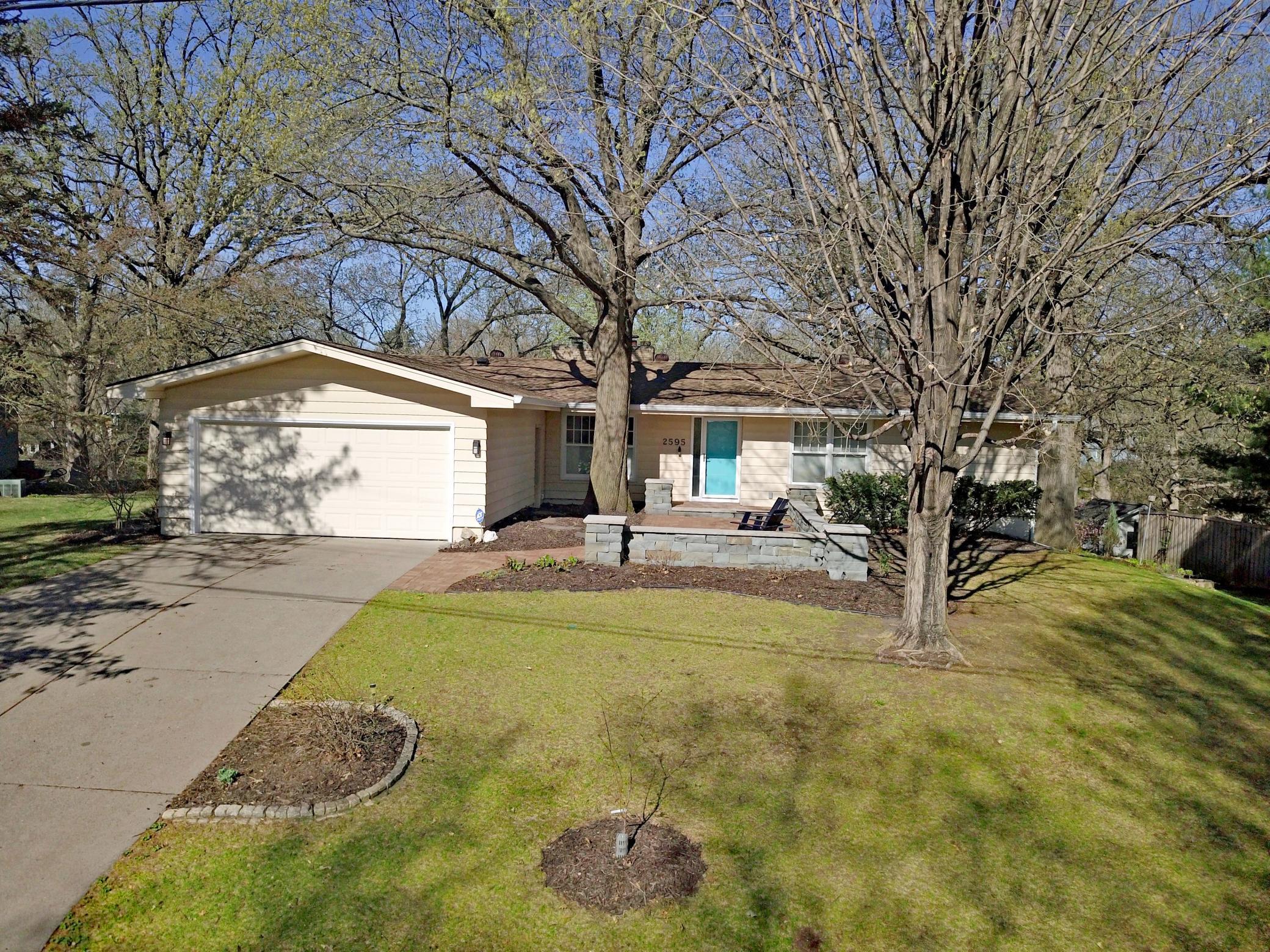 Welcome to this quality built and beautifully cared for mid-century walkout rambler that backs onto the natural beauty of Bassett Creek in one of the loveliest streets in Golden Valley!