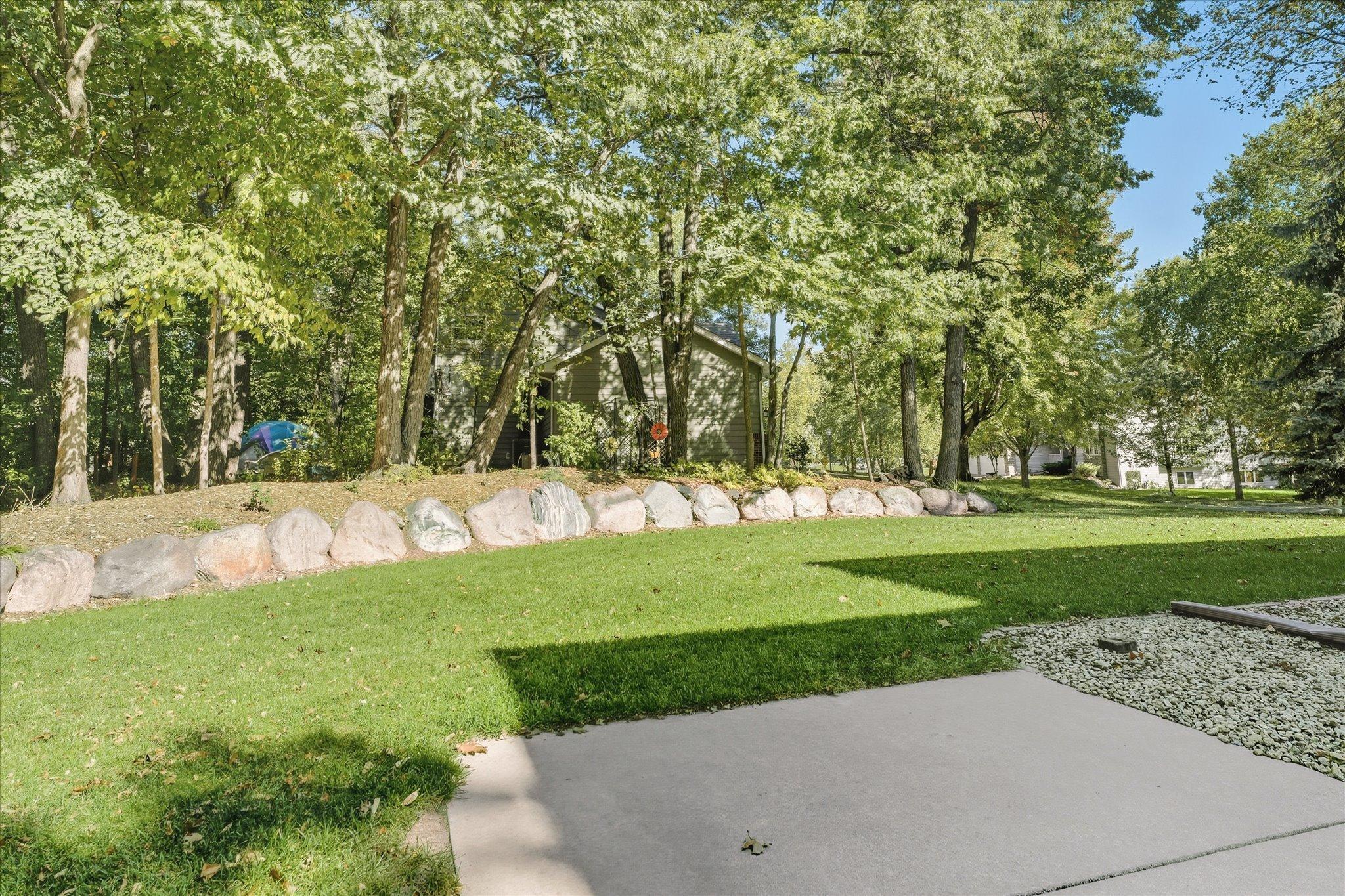 Watch the kids play and pets roam in your private level wooded backyard
Irritation system keeps the lawn green while you relax/entertain family/friends