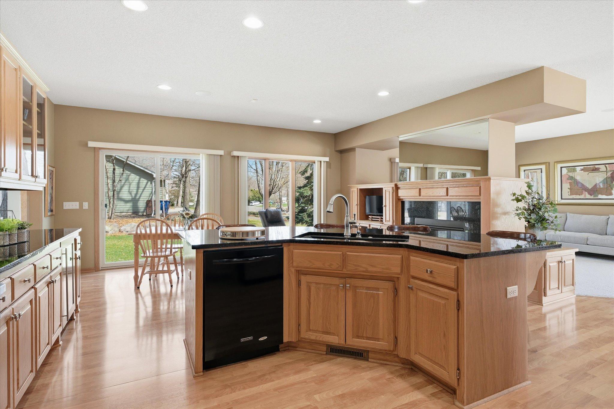 Open Kitchen to spacious Informal Dining Room with plenty of space for larger table