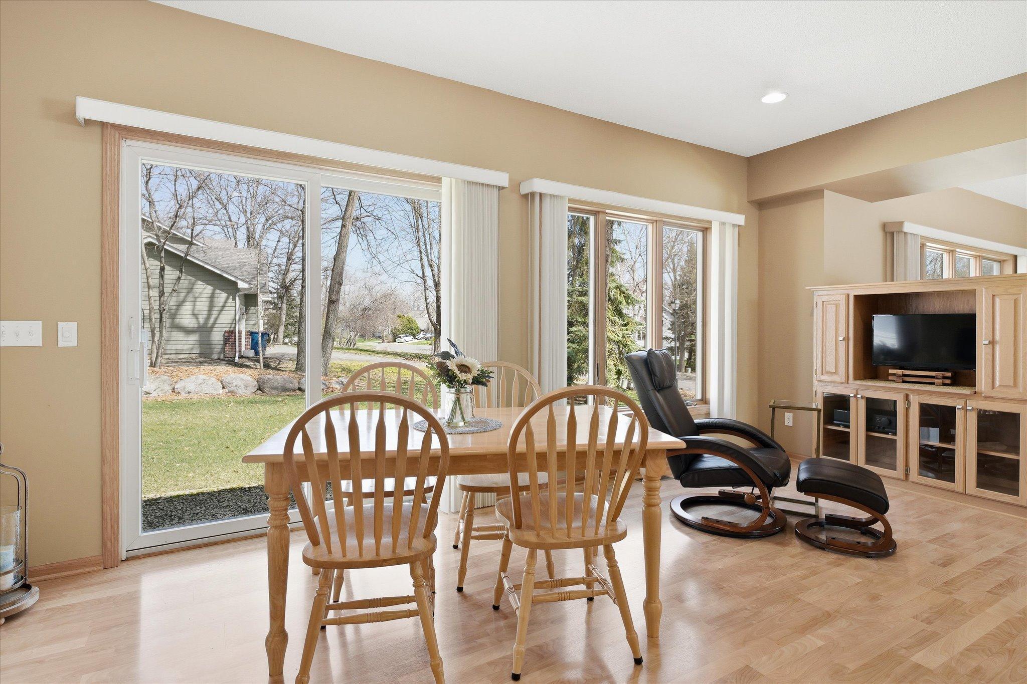 Informal Dining Room area with sliders to future deck or patio. Nice open space will easly fit larger table. Built-in cabinets