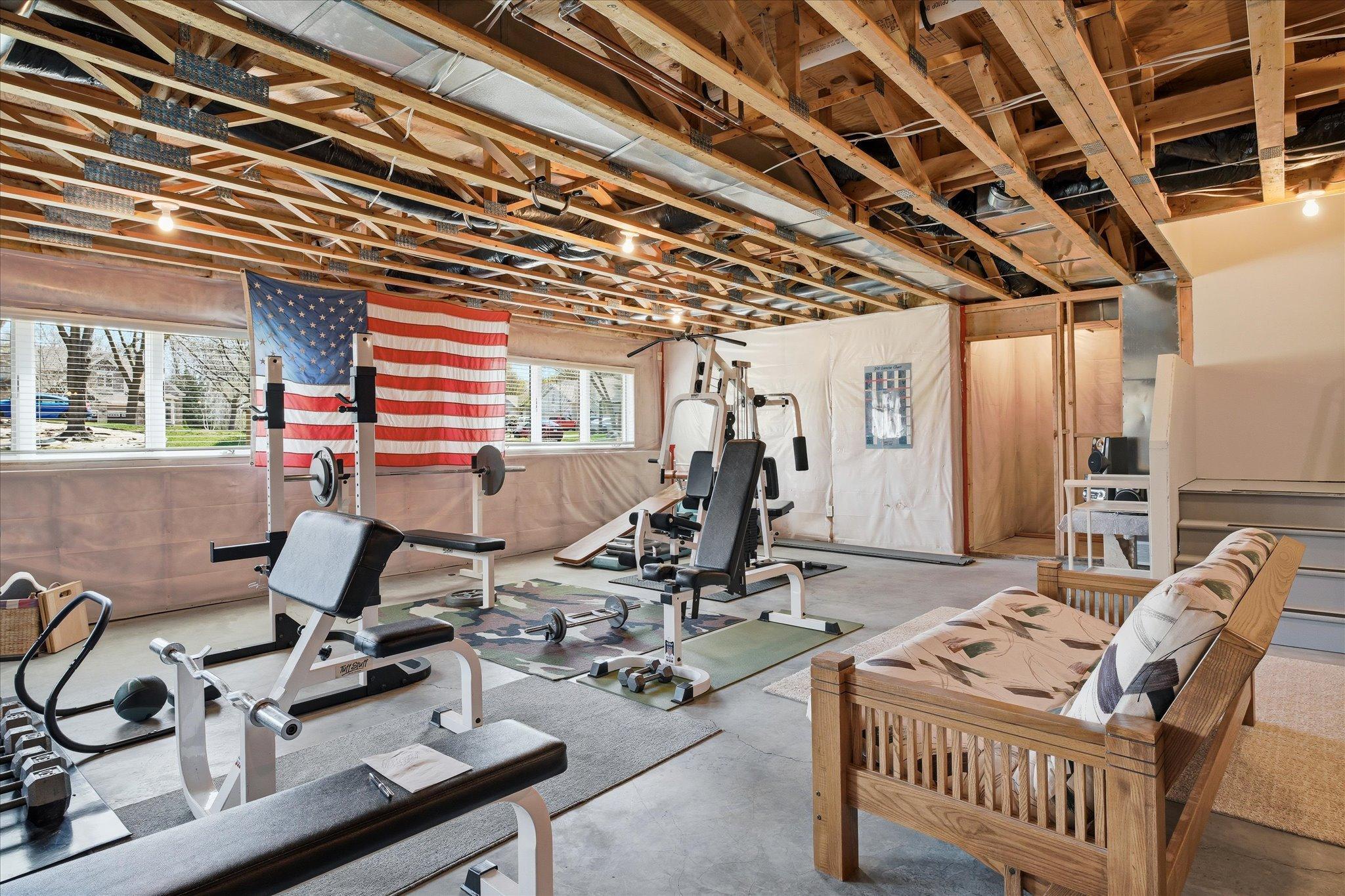 Plenty of open space in lower level to add a future 5th and 6th bedroom and future 4th bathroom. Open trusses for easy lighting and wiring in future