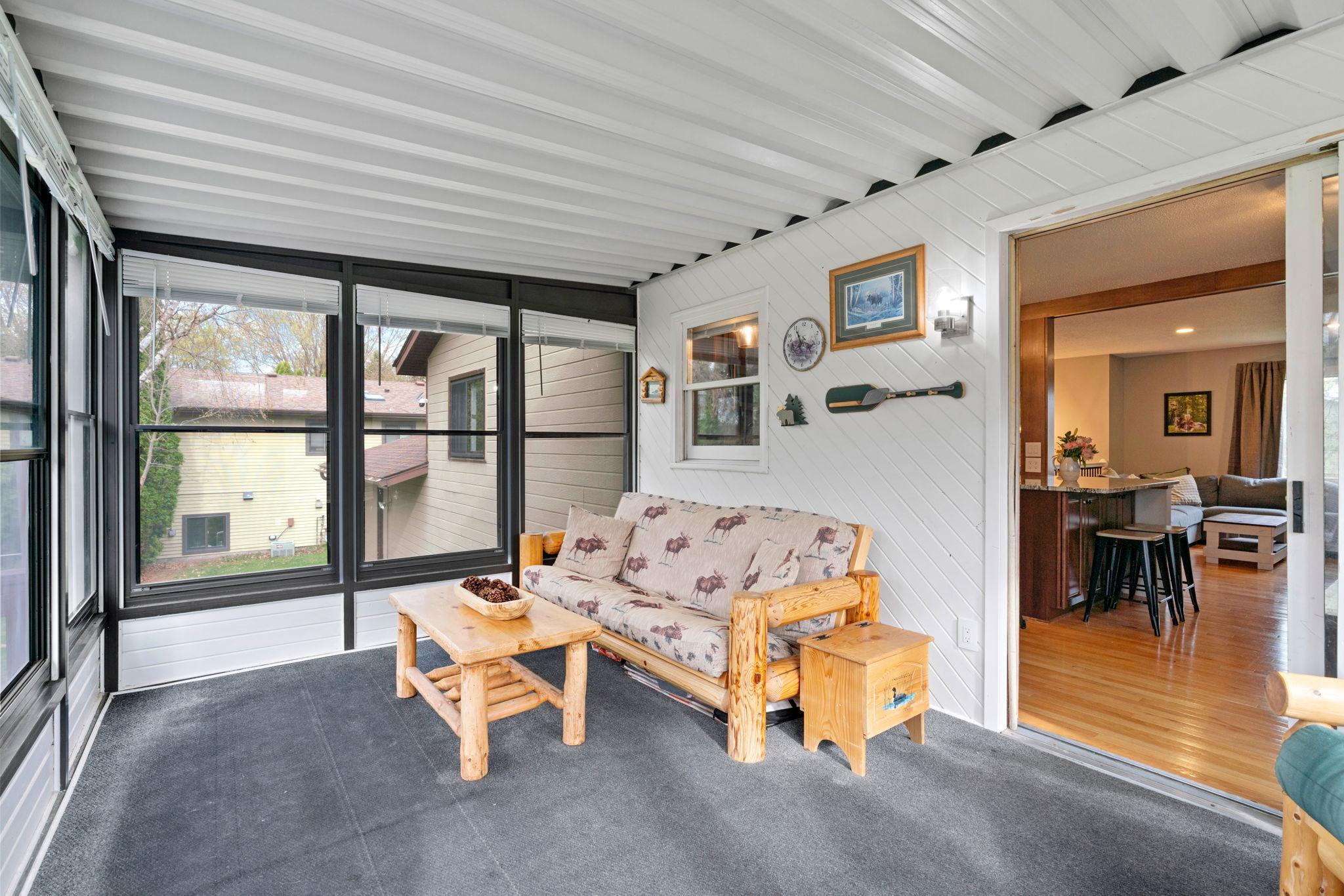Screened Porch with indoor outdoor flow to kitchen