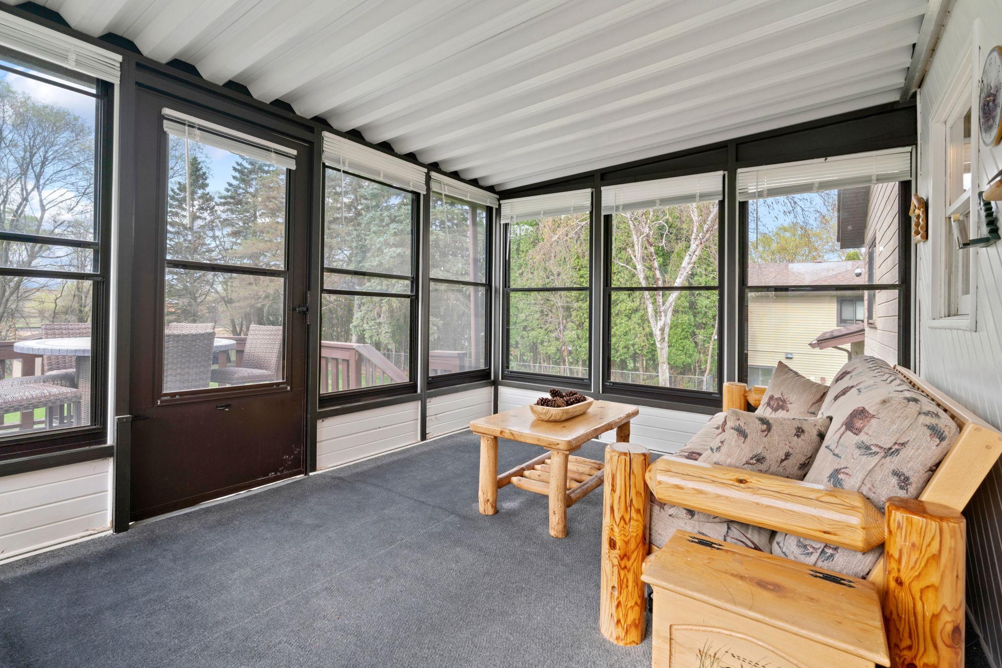 Spacious Screened Porch with peaceful views