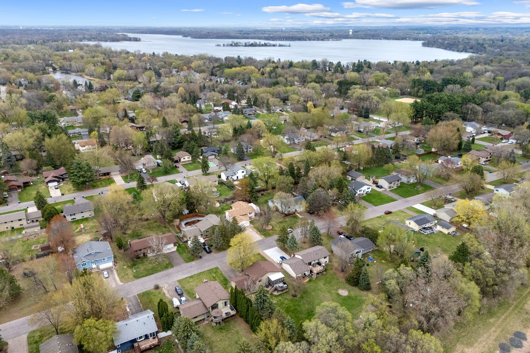 Aerial View of surrounding neighborhood and nearby lakes