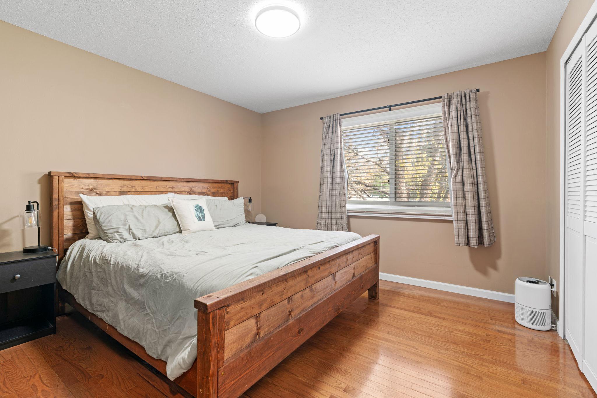 Main Level Bedroom with natural light