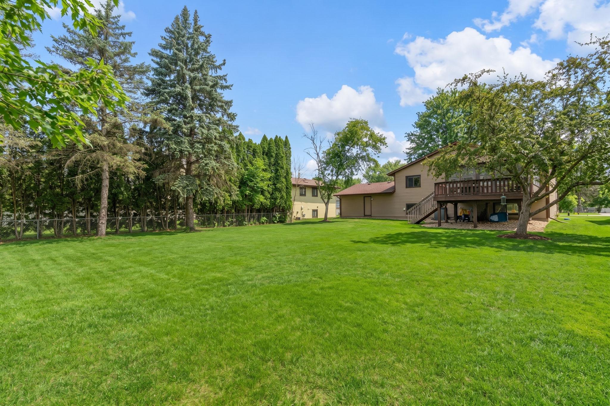 Expansive Backyard with Deck and Room to Enjoy