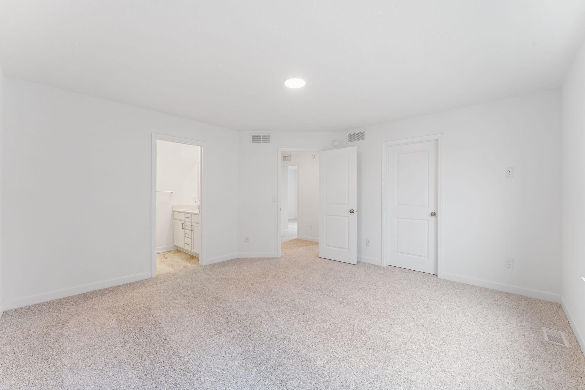 The bedroom has direct access to the private bathroom and closet