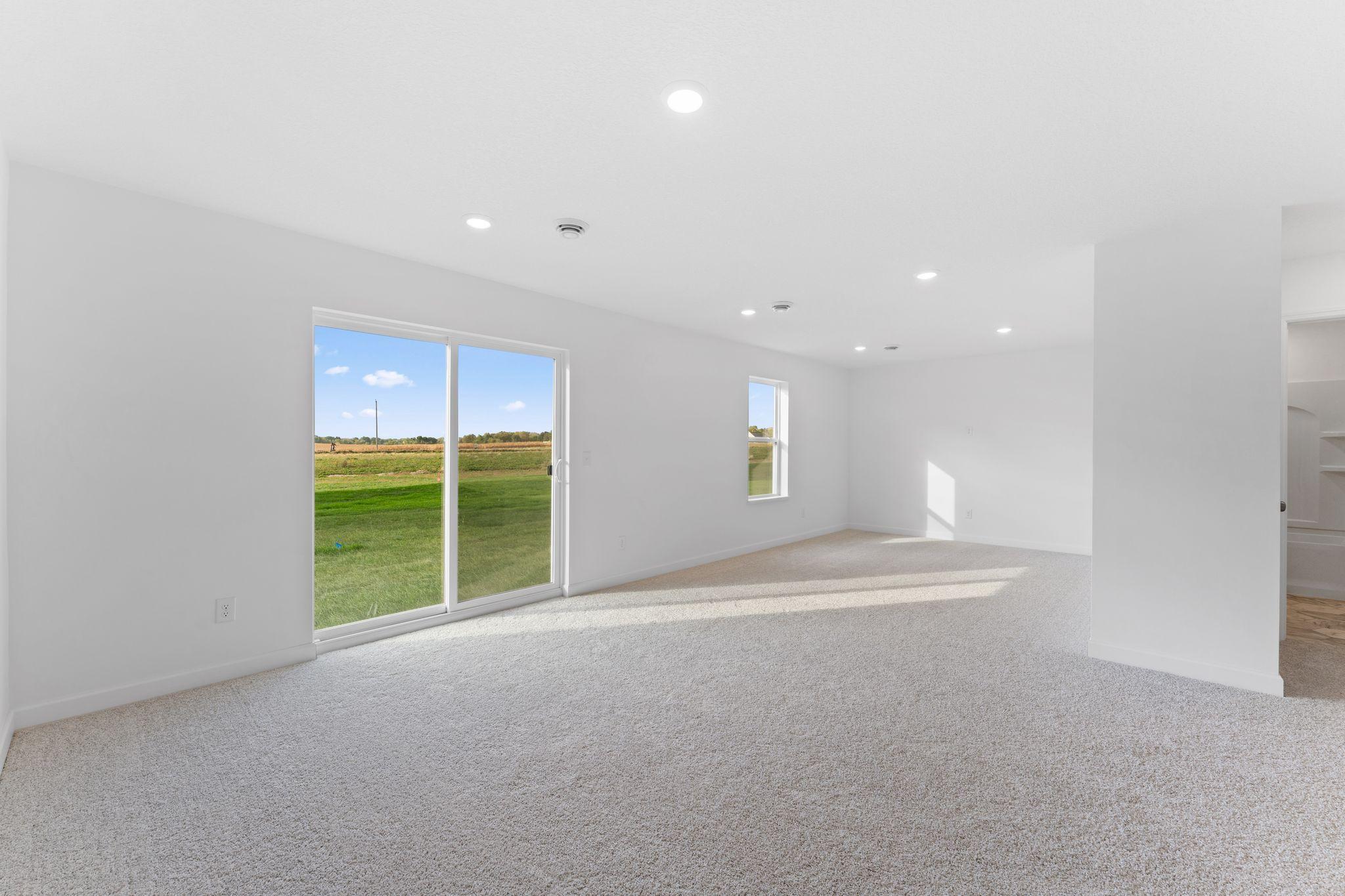 The finished basement offers enhanced versatility with a recreation room and a secondary bedroom, with the addition of a laundry closet and a full-sized bathroom