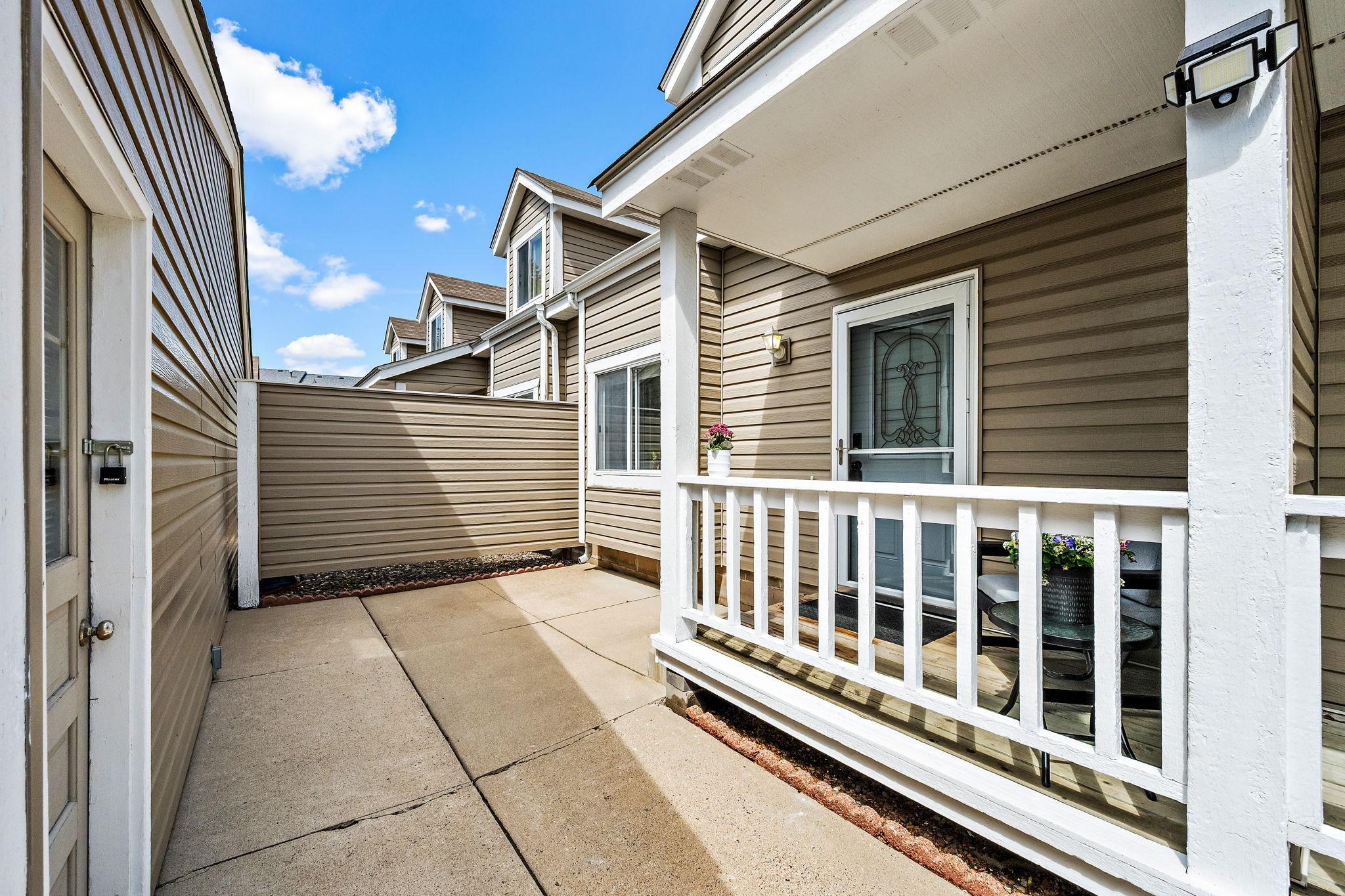 Front Porch and Patio offer a peaceful space with easy access to the garage.