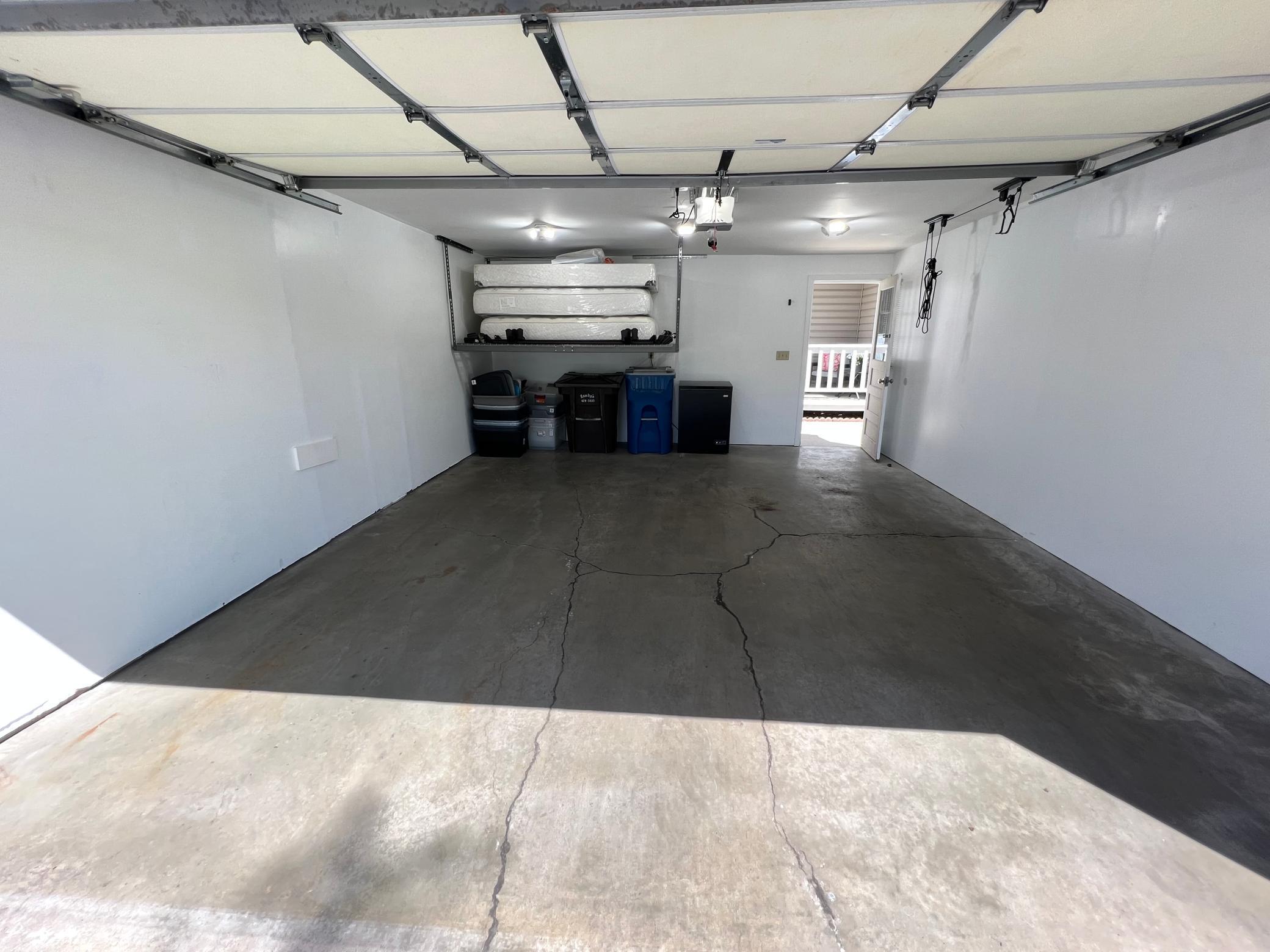 Immaculate, Insulated 2-Car Garage has great overhead storage.