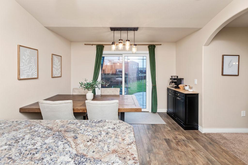 Breakfast bar to Dining space & views to backyard
