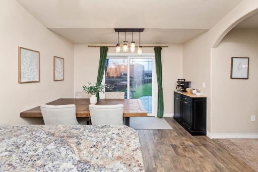 Breakfast bar to Dining space & views to backyard