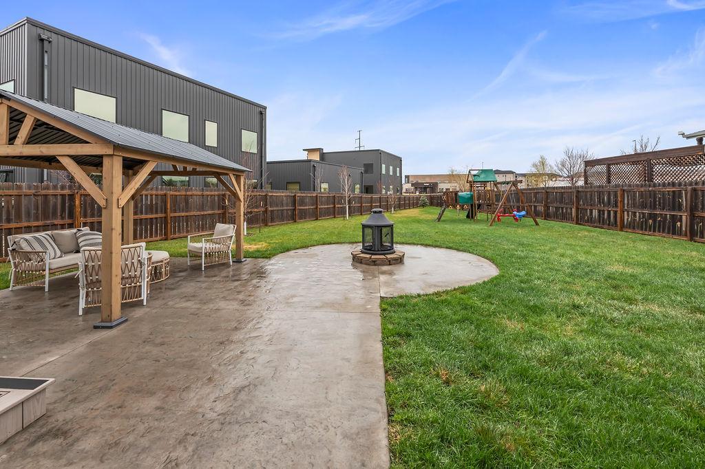 HUGE yard, fully fenced, tons of space to entertain & play
