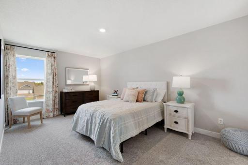 Each of the secondary bedrooms upstairs is spacious.