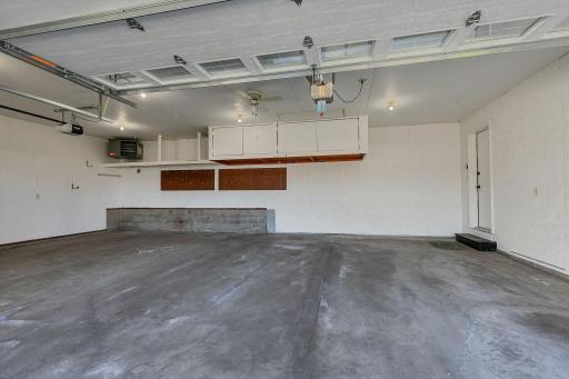 Heated 3 car garage w/need insulated garage doors