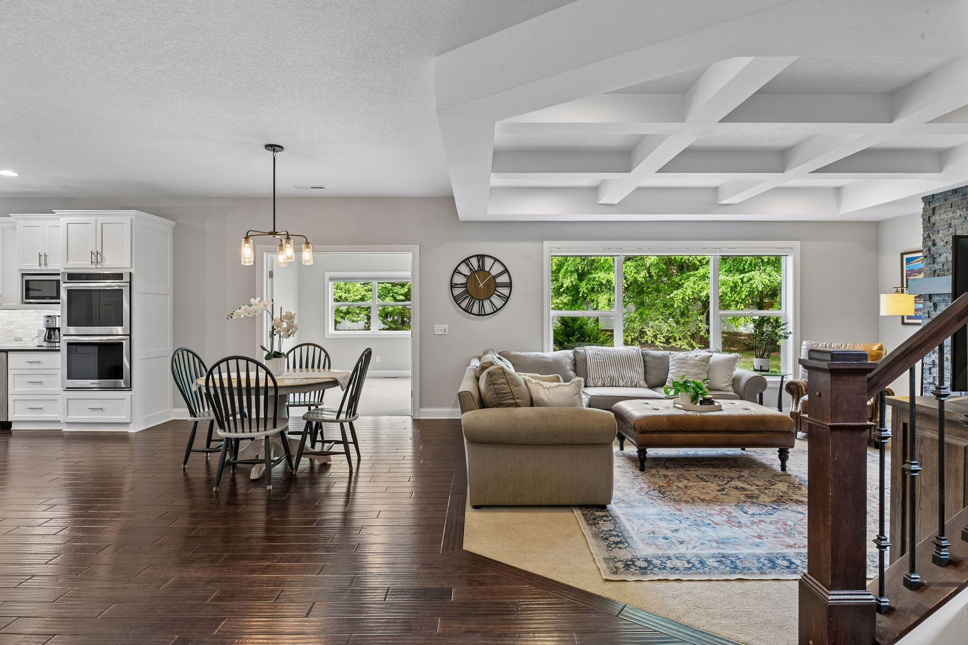 Dining area flows seamlessly to the living room with ample natural light