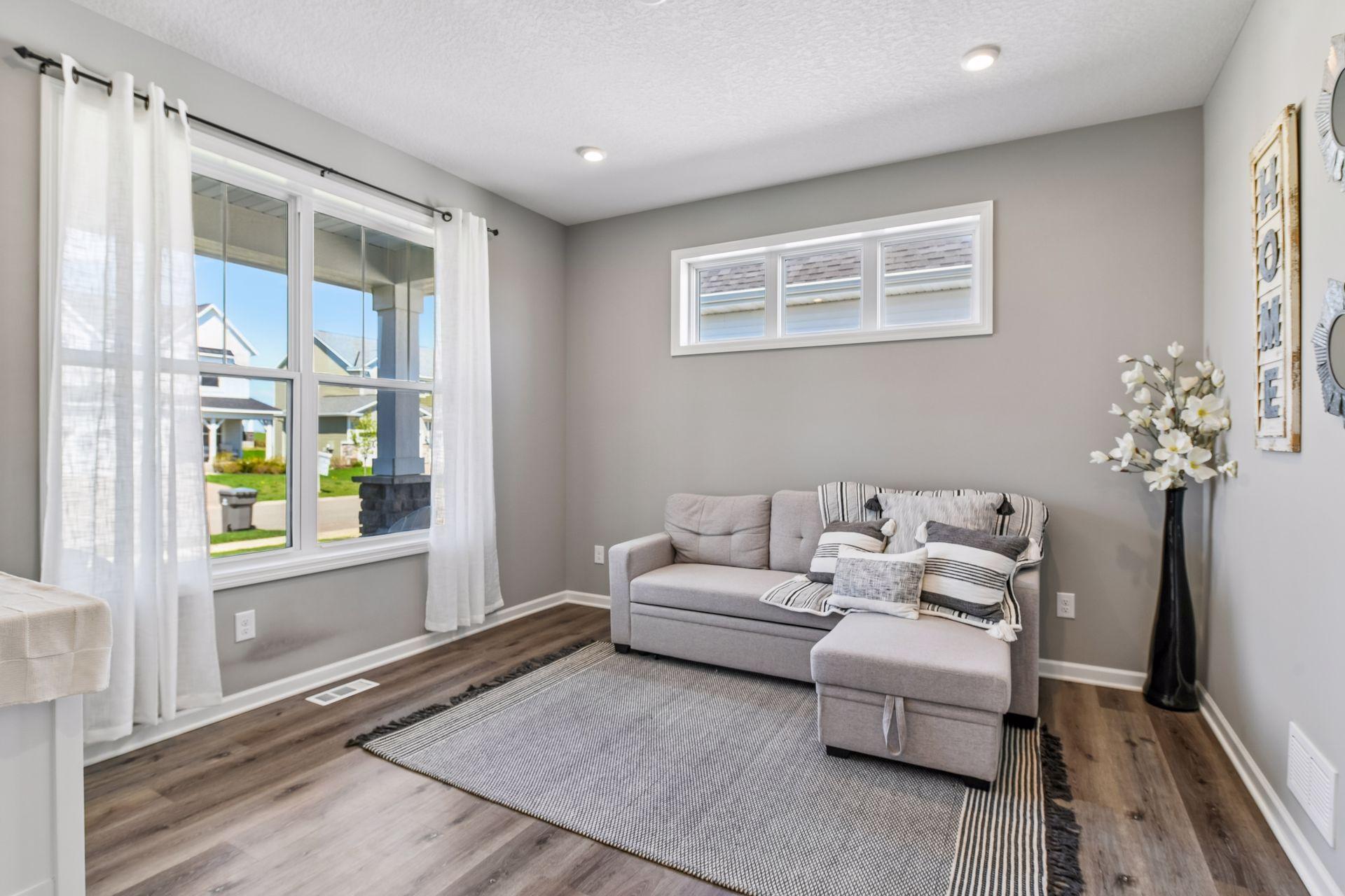 Just off the front of the home you will find office space with French doors and transom oversized windows to let in the natural light